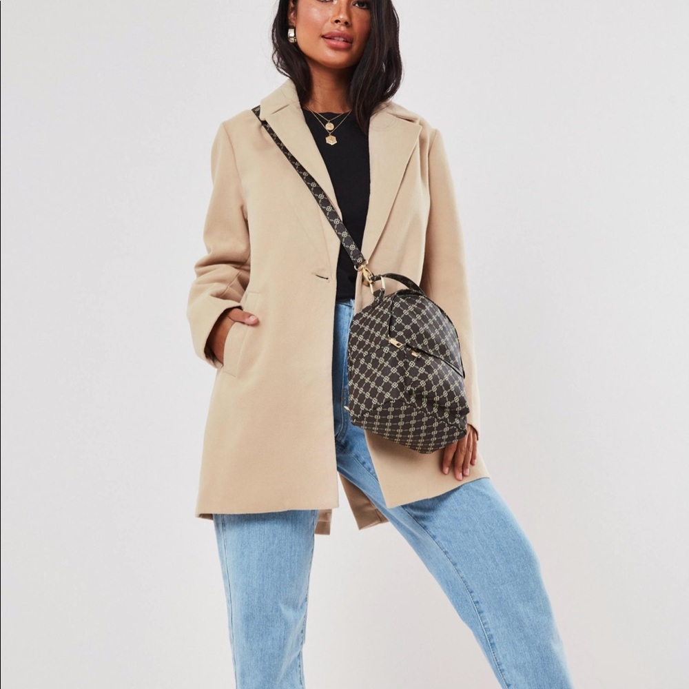 New with tags trench coat